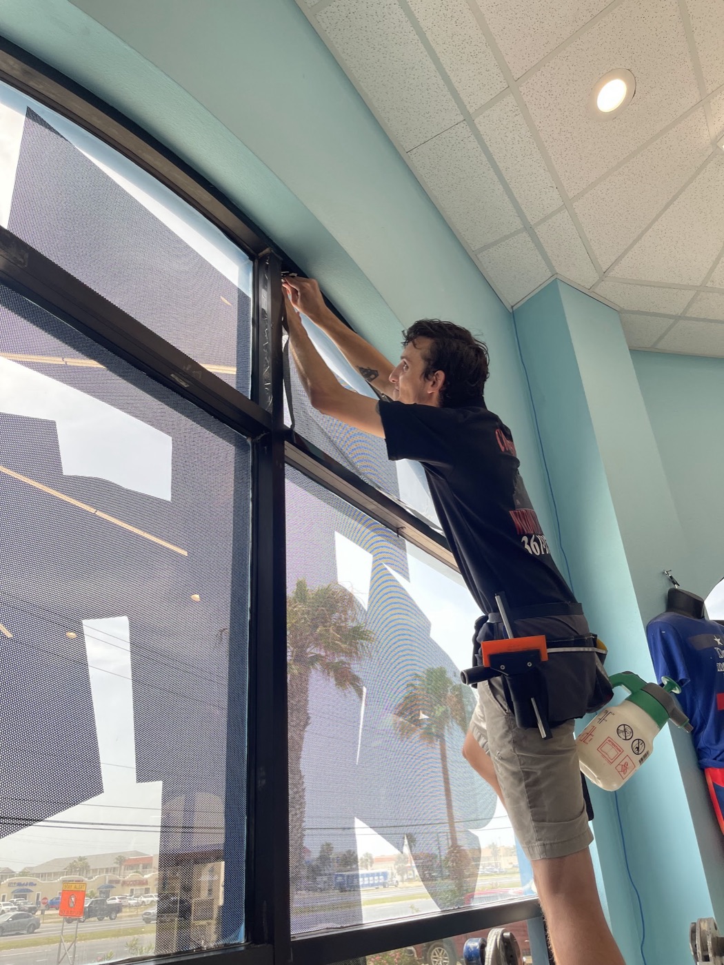Window tint installation by Top Quality Tint & Graphics